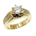 Diamond Essence Ring With 1 Ct. Round Brilliant Center Set in Six Prong Setting and Sparkling Melee on The Band Enhance the look in 14K Yellow Gold,1.25 Cts.T.W.
