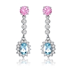 A beautiful designer dangling. 1.5 ct. oval Blue Topaz essence surrounded by round brilliant melee,  and 1 ct. round Pink Essence are connected by bezel set round stones. 6 cts.t.w. in Platinum Plated Sterling Silver.