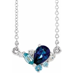 A marvelous and prong set designer 18 " long necklace for women with sapphire pear cut, aquamarine marquise and round brilliant Diamonds by Diamond Essence set in platinum plated sterling silver. 1.50 Cts.t.w.