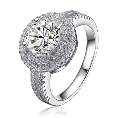 Diamond Essence Designer Ring with 2.25 carat Round Essence in center, surrounded by Round Essence melee in two rows around and two delicate rows on the band for more elegance. Appx. 3.50 Cts. T.W. set in Platinum Plated Sterling Silver.
