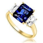 Sapphire Ring - 4.0 Cts. Radiant Emerald cut Saphhire Essence in center accompanied by Radiant Emerald cut Diamond Essence on sides. 5.0 Cts. T.W. set in 14K Gold Vermeil.
