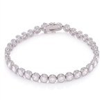 14k white gold Bracelet, 7", with round bezel set Diamond Essence stones 0.25 cts. each, 32 in all, 8.75 cts.t.w.