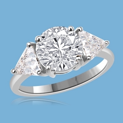 Risque - Diamond Essence Ring with 2 Carat Round Cut Diamond Essence Center and 0.5 Ct. Each trilliant cut side accents, in 14K White Gold.