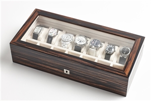 A stunning Spider Ebony Macassar luxury watch box with glass display top, fully lockable design
