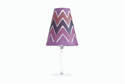 Ikat Red Wine Glass Shades by di Potter are a pink violet and deep purple color with orange accents in a ikat chevron zig zag modern pattern made of vellum paper place on a wine glass with a flameless tea light