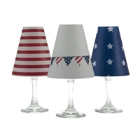 Set of 6 coordinating red white and blue translucent paper white wine glass shades by di Potter.  Simple add a tea light to a wine glass to create simple table decor.  Made in the USA