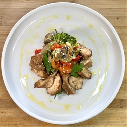 Juicy chicken, seared to perfection and tossed in our tangy and sweet sesame sauce.  Served with our vegetable medley of white onions, red peppers, mushrooms, celery, broccoli sauteed in our garlic olive oil blend.