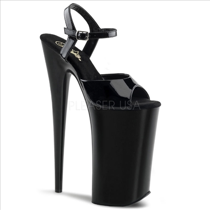 Stand out in a crowd with these 10 inch heel, 6 1/4 inch platform, ankle strap sandals by Pleasers. Featured with a black platform bottom and heel and black patent.
