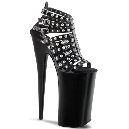 Extreme fetish shoes would include these height giving 10 inch heel, 6 1/4 inch platform spiky studs strappy sandals. 3 straps of this shoes have buckles.