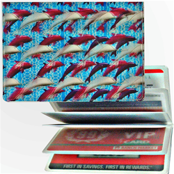 Lenticular credit card ID holder with purple and white dolphins on a blue background, depth