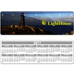 Lenticular ruler with lighthouse on a peninsula, casting a blinding light across the night sky onto the ocean for ship naviation, animation
