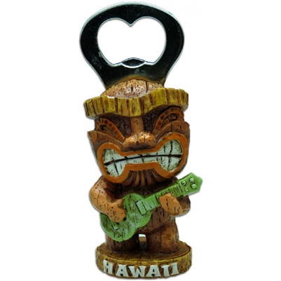 Standup, wood colored tiki bottle opener playing a green ukulele, with the words Hawaii on the base