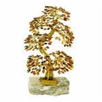 The leaves of this bonsai style tree are made with real polished amber stones attached to branches and trunk of twisted brass wire. The tree sits atop a piece of the finest Polish marble called "Marianna". Brass tag is in English.