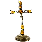 Hand made in Gdansk, the beautiful crucifix is made with natural Baltic amber embedded in an artistic cross. Brass base and body of Christ. Removable base.