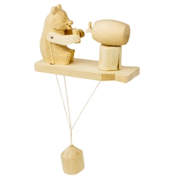 Wooden spin toy from Russia that will bring smiles to all who try it! This bear is a two fisted drinker with a cup in each hand! A perfect example of an old fashioned action toy.