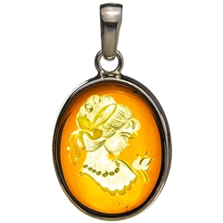Beautiful oval shaped sterling silver amber cameo pendant. The cameo is hand carved from the back of the pendant. Nicely detailed. Size is approx 1.5" x .8".