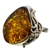 A beautiful amber cabochon framed in a classic sterling silver frame. Size is approx 1.25" x 1".