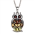 Sterling silver owl studded with multi-color amber. Pendant size is approx. 1" h x .6" w.