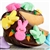 This Easter Gigantic fortune cookie is chocolate covered and decorated with marshmallow Peeps for springing into spring.