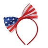 The Patriotic Bow Headband features a fabric bow printed with the stars and stripes attached to a red fabric covered headband. Sized to fit most adults and large children. One per package. Perfect for 4th of July or any patriotic event.